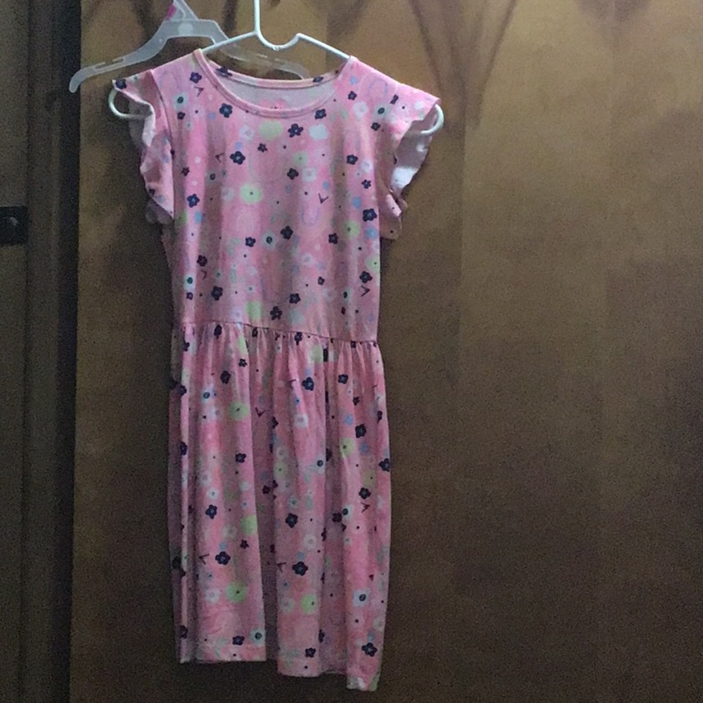 Pink, short sleeve, dress with flowers on it